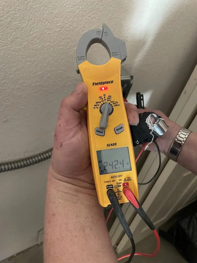 Voltage testing with clamp meter during Hot Tub / Pool Electrical Wiring in Bixby